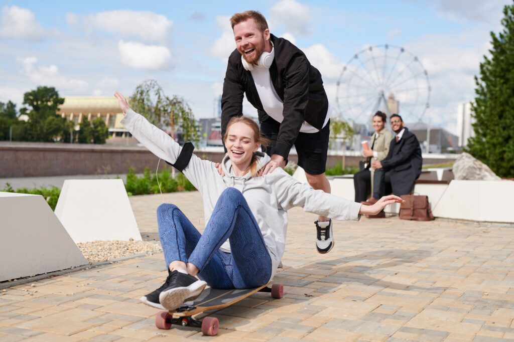 Friends riding on skateboard